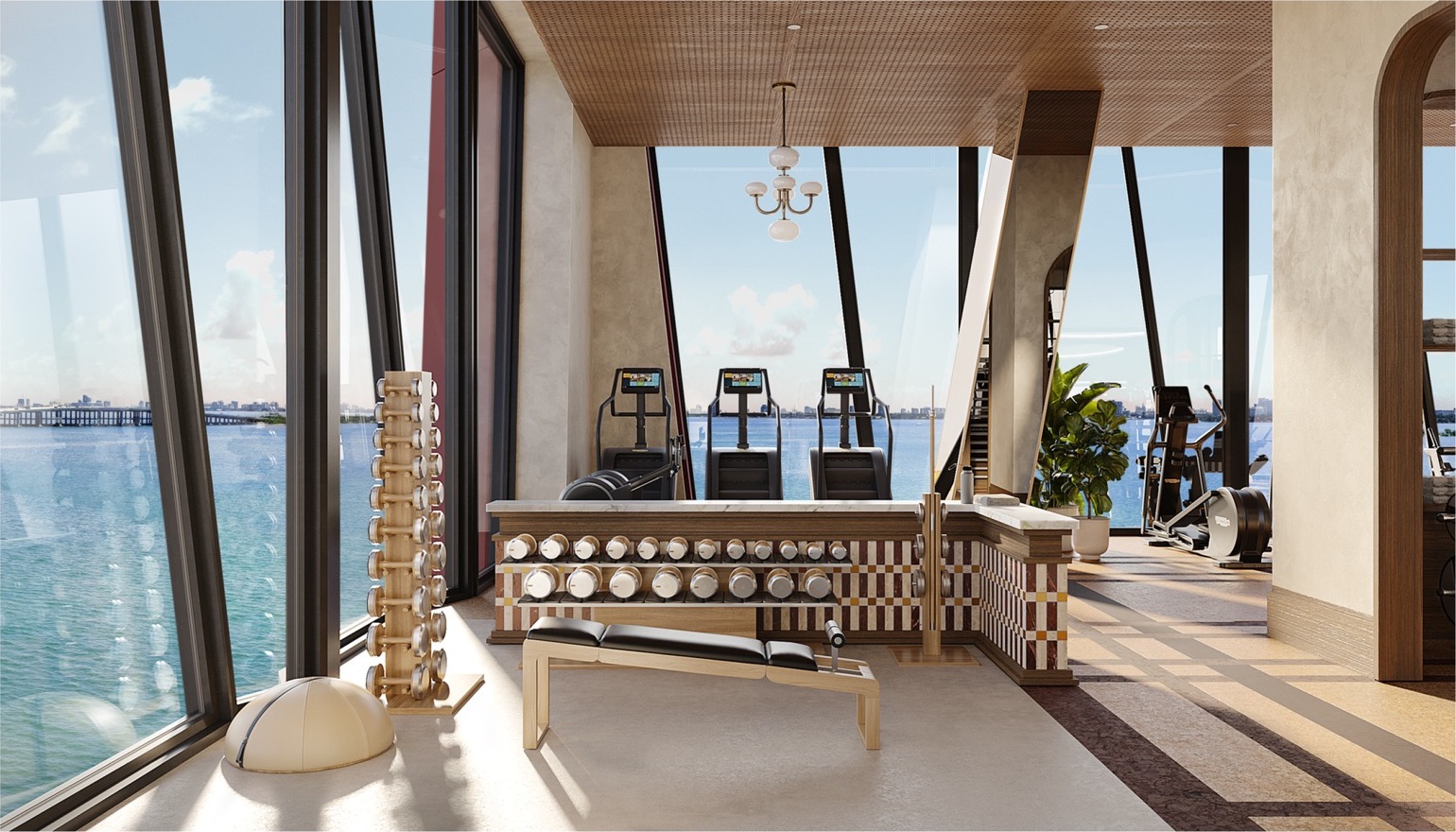 Technogym fitness center at Villa Miami — state-of-the-art equipment with yoga, pilates, and boxing studios.