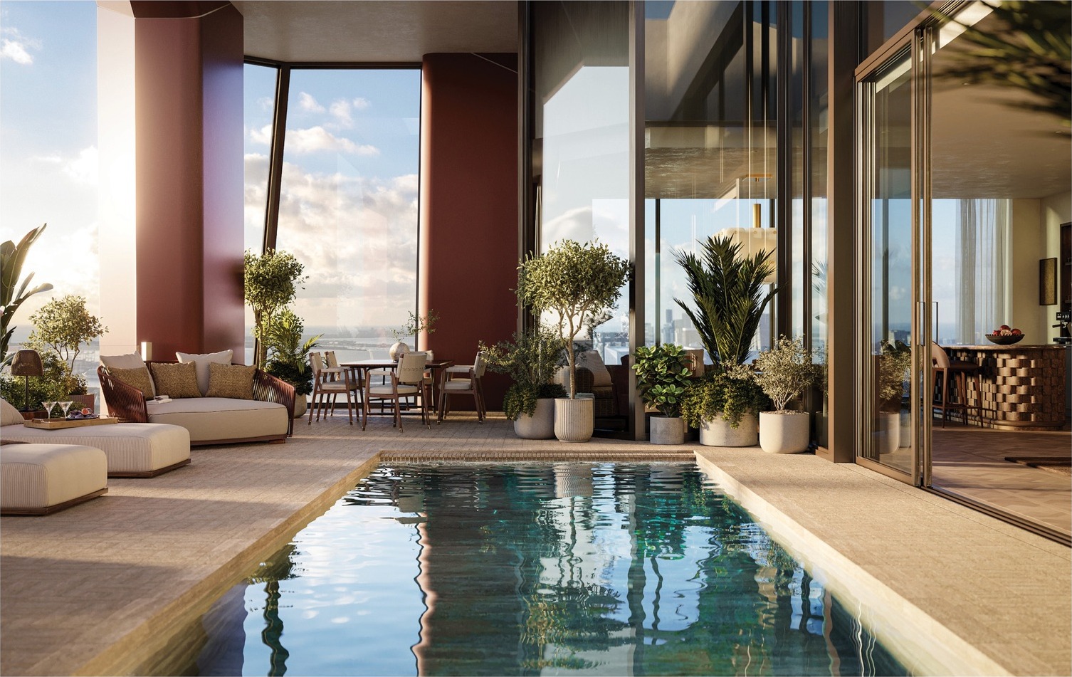 Private rooftop pool of the Villa Triplo Penthouse — adjacent to the rooftop helipad, with Biscayne Bay panorama.