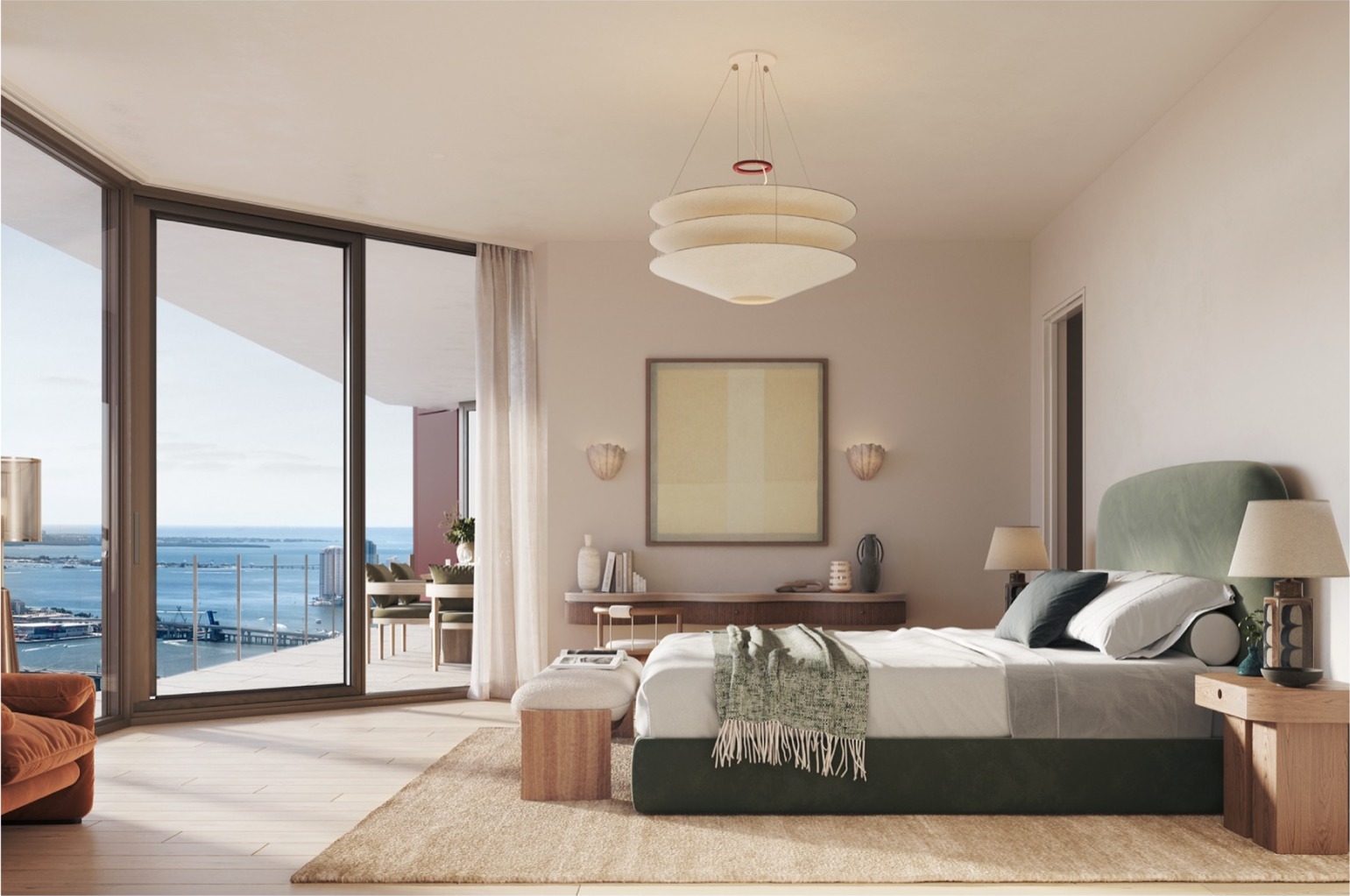 Primary suite at Villa Miami — sweeping bay views, lounge area, direct balcony access.